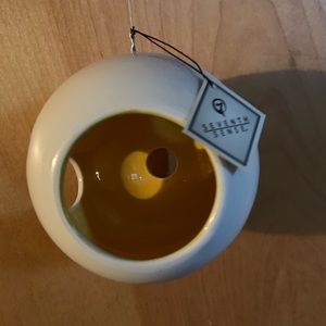 Hanging ceramic globes for candles or terrariums